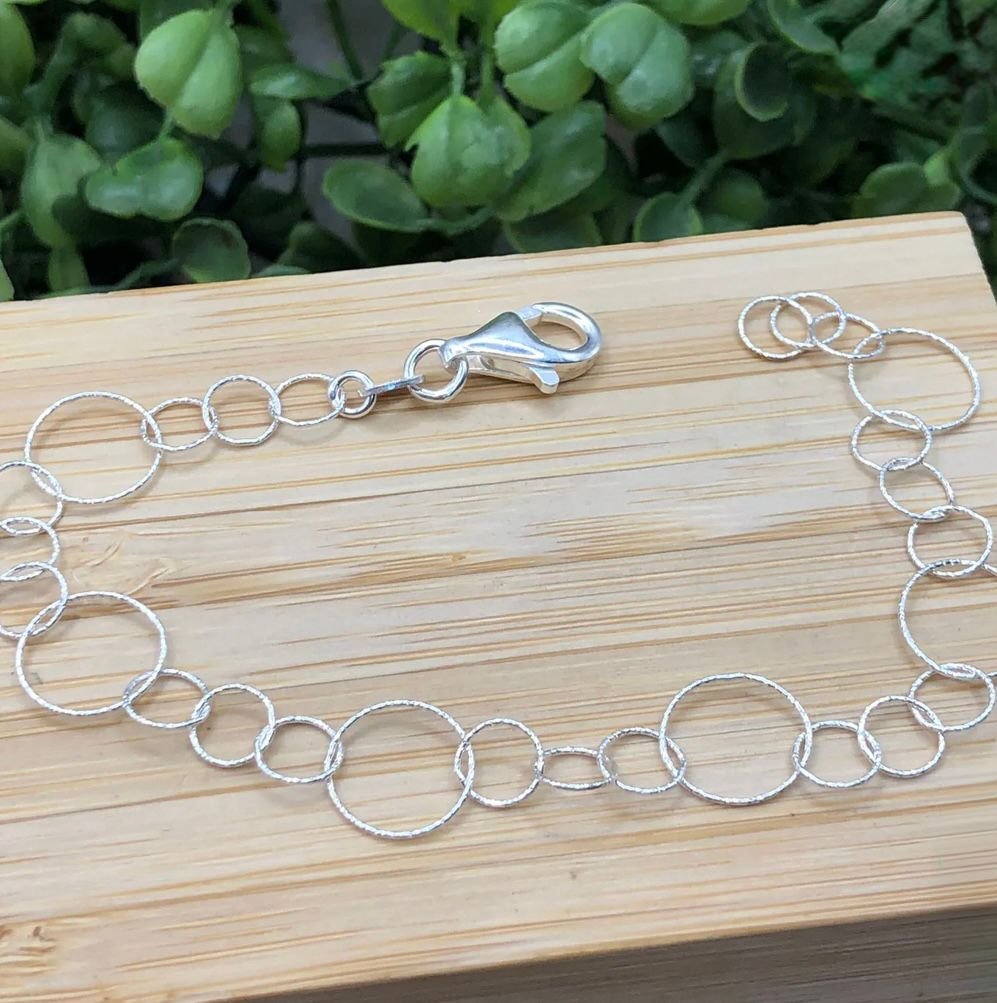 Pulseira elo círculos trançados ILUSTRATIVO